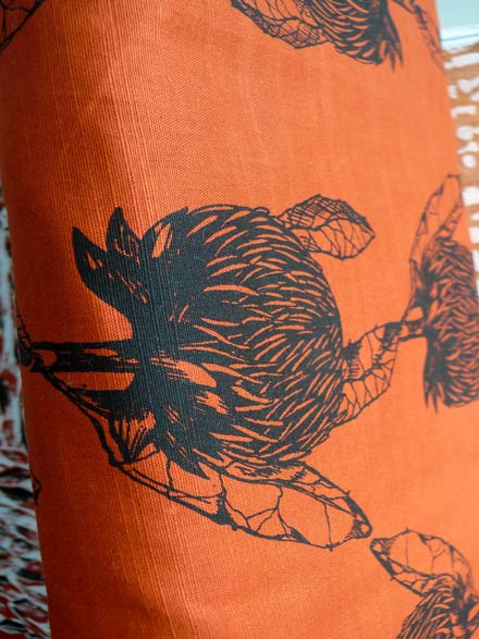 Black Telopea Pattern Print on orange Slub Cotton